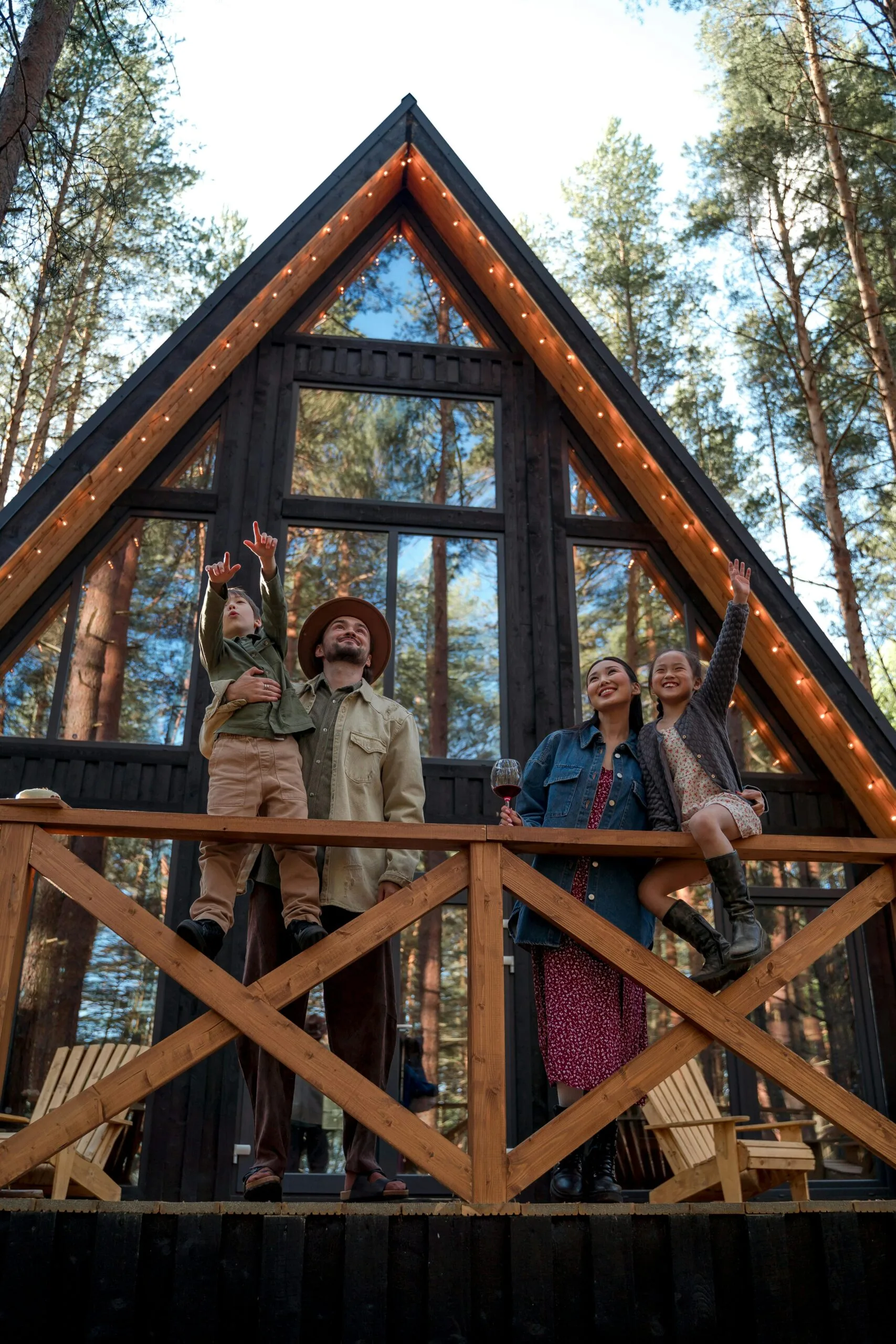 Family enjoying a beautiful cabin in the woods